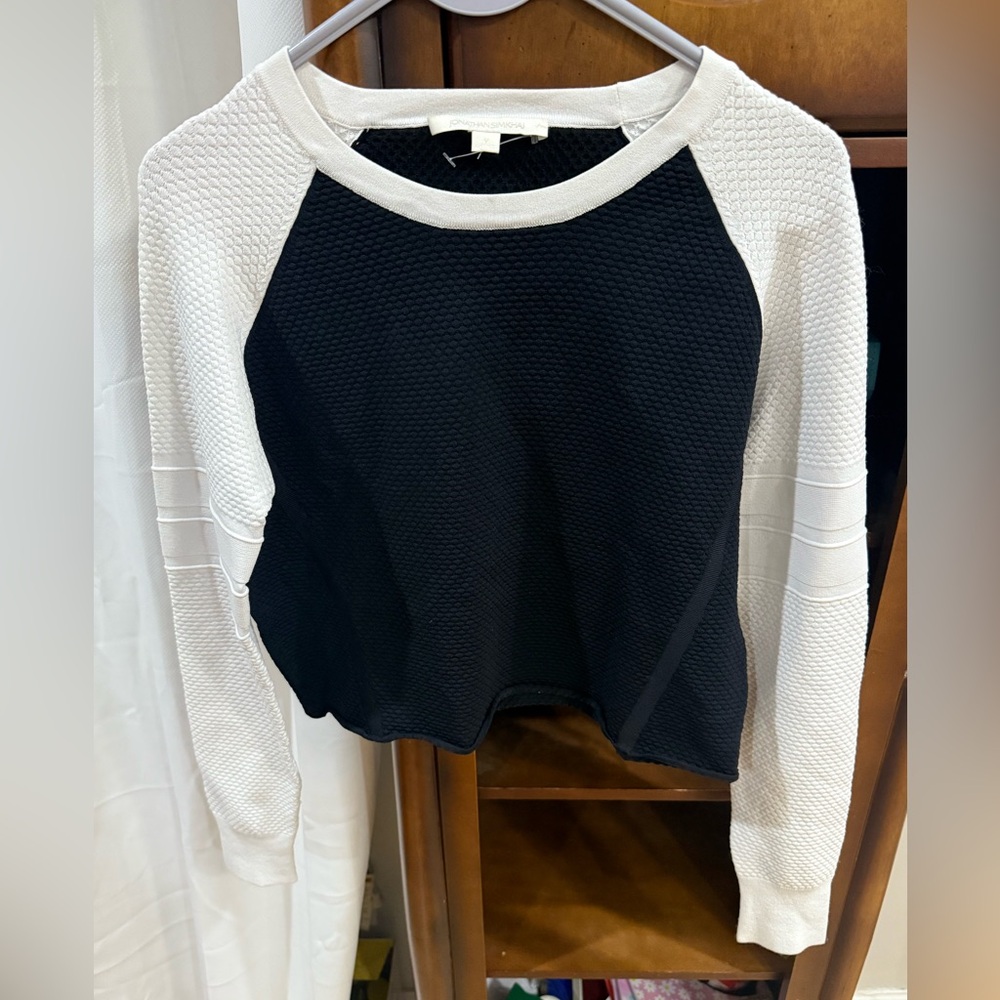 Jonathan Simkhai black and white shirt has never been worn,has tags size medium